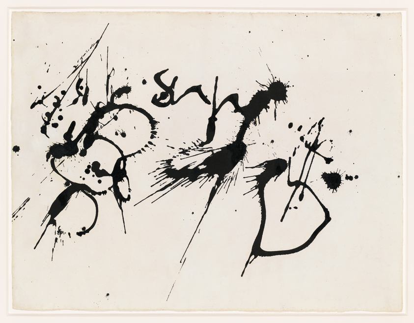 Abstract black ink splatters and strokes on a white paper background, creating a dynamic and expressive composition.
